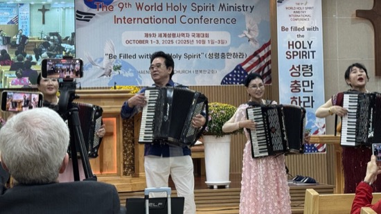 A group of people playing an accordion