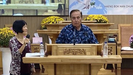 A person standing at a podium