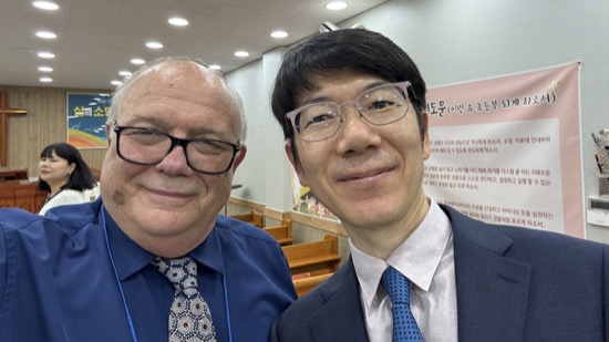 Two men in suits and ties