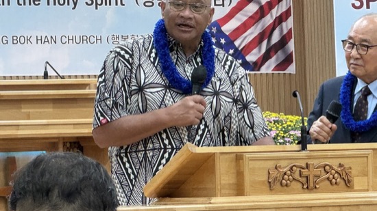 A person standing at a podium
