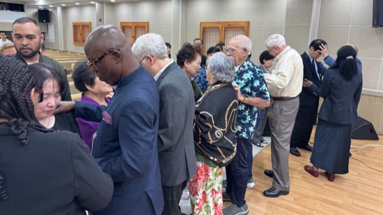 A group of people standing in a line