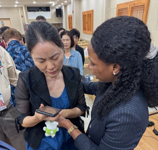 A person looking at a cellphone