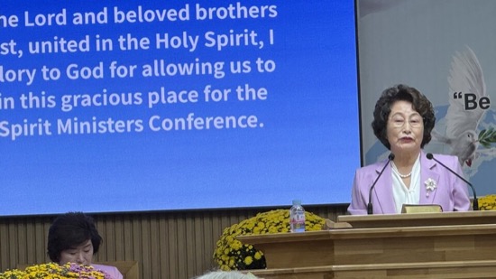 A person standing at a podium