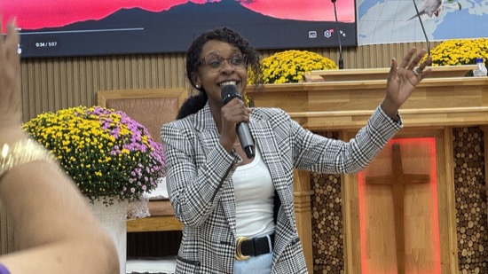 A person holding a microphone