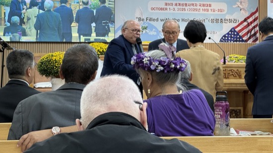 A group of people sitting in a room