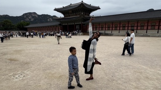 A person and a child posing for a picture