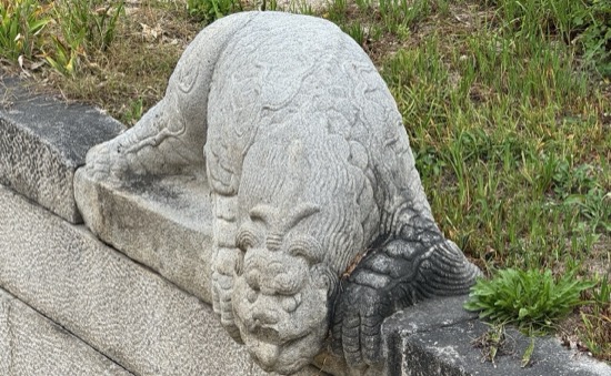 A stone sculpture of a lion