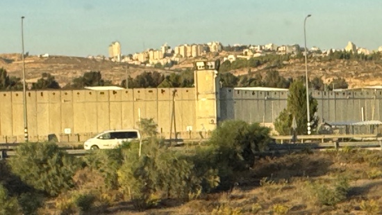 A building with a city in the background