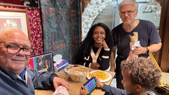 A group of people sitting at a table
