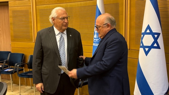 A person holding a piece of paper