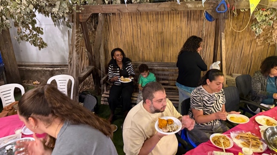 A group of people eating food