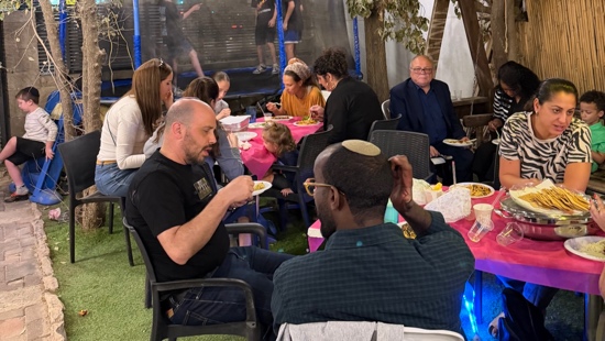 A group of people sitting at a table