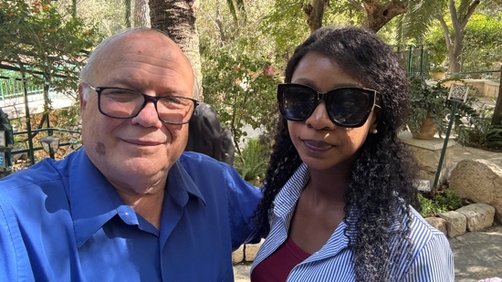 A person and person taking a selfie