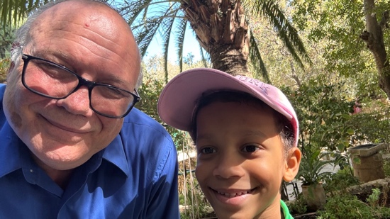 A person and child smiling for a picture