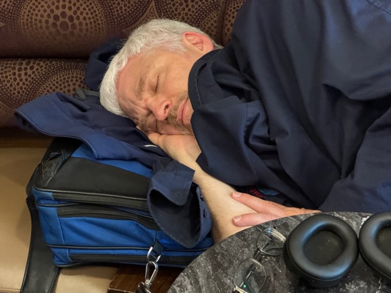 A person sleeping on a couch