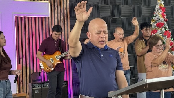 A group of men playing instruments