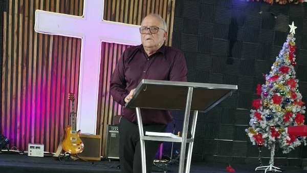 A person standing at a podium