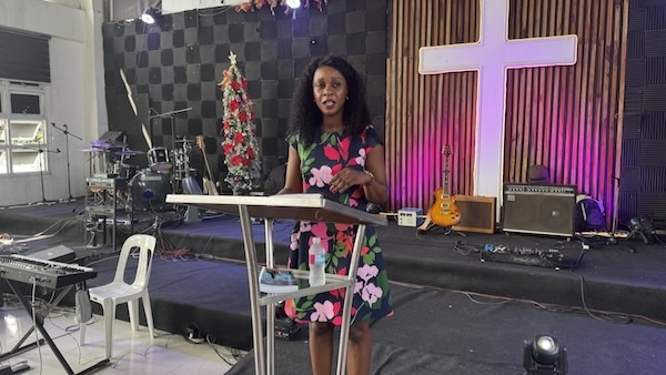 A person standing at a podium