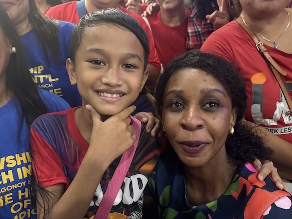 A person and a child posing for a picture