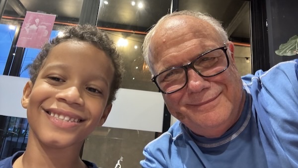 A person and child taking a selfie