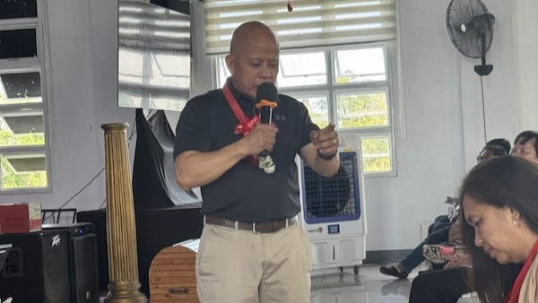 A person holding a microphone