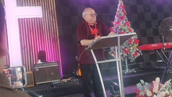 A person standing at a podium