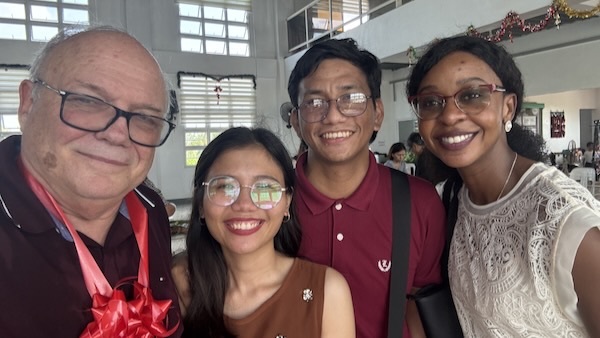 A group of people posing for a photo