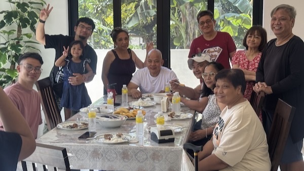 A group of people around a table