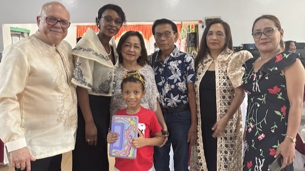 A group of people posing for a photo