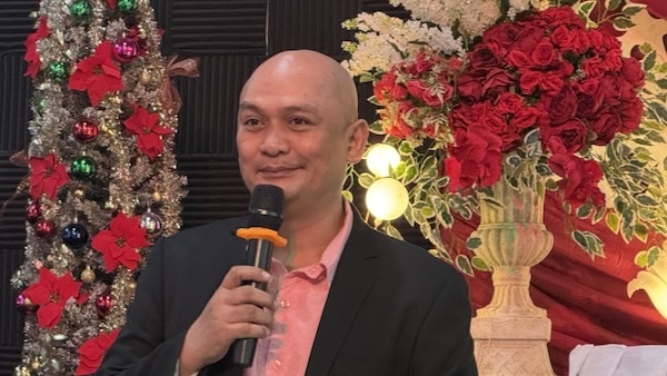 A person holding a microphone