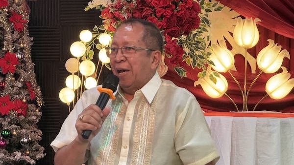 A person holding a microphone