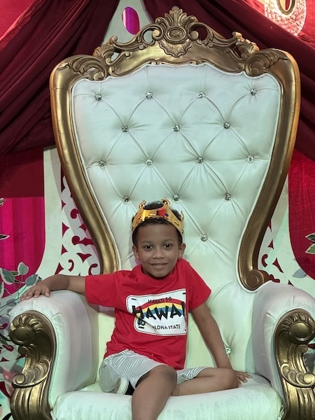 A child sitting in a chair