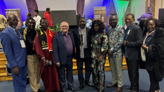 A group of people posing for a photo

Description automatically generated