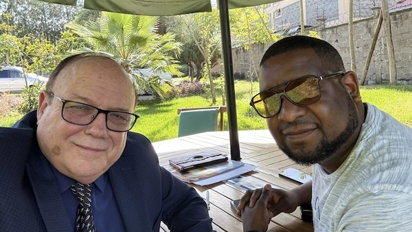 Two men sitting at a table