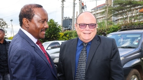 A couple of men in suits