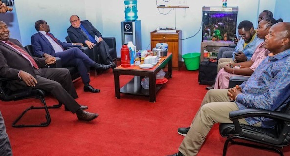 A group of people sitting in a room