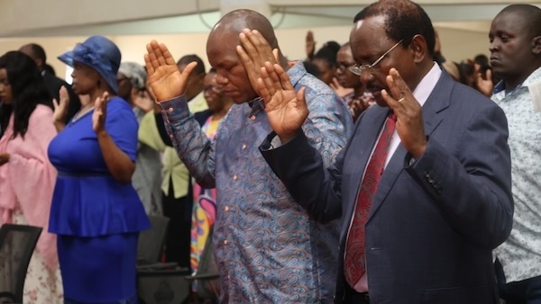 A group of people praying