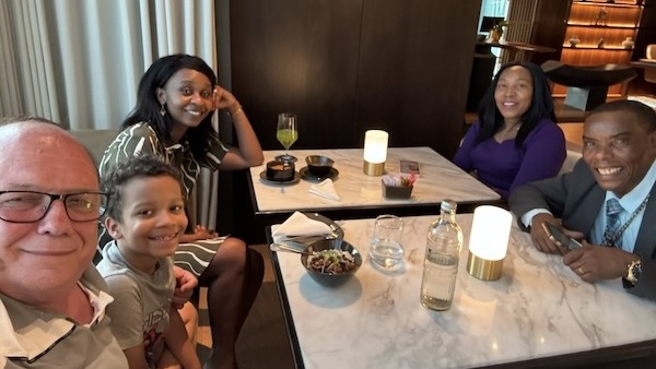 A group of people sitting at a table
