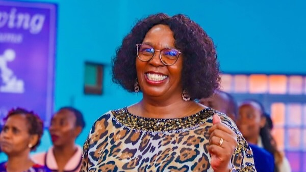 A person with glasses and a leopard print shirt