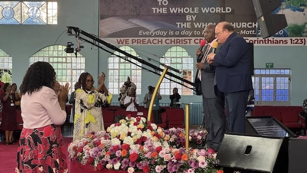 A group of people standing on a stage