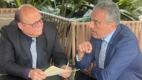 Two men sitting at a table