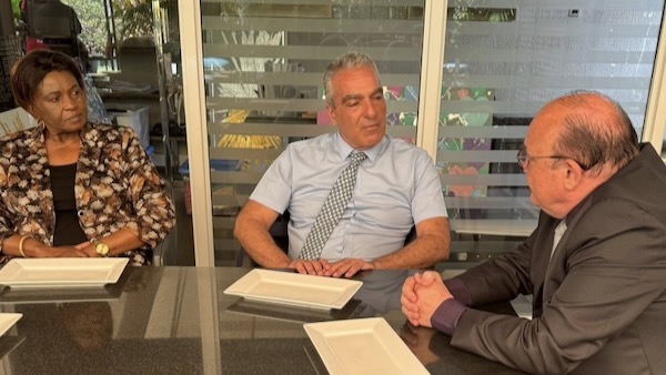 A group of people sitting at a table