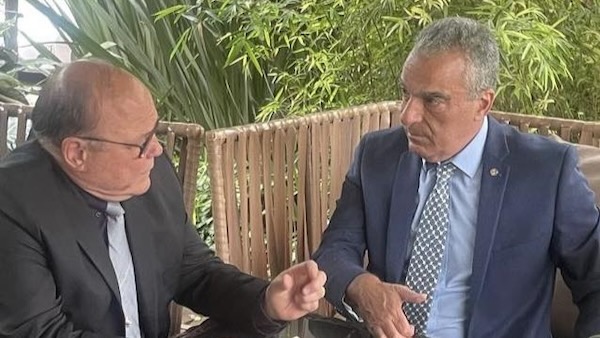 Two men sitting at a table