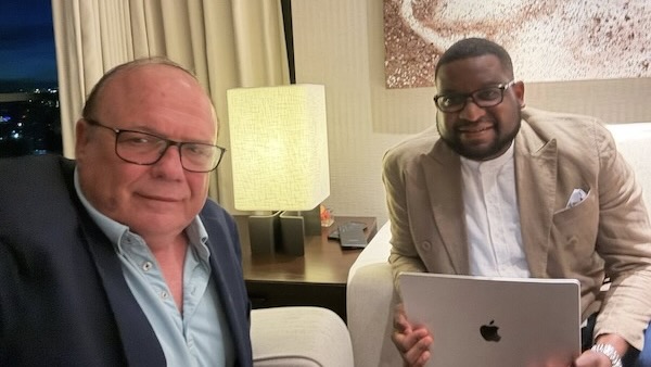 Two men sitting in a room