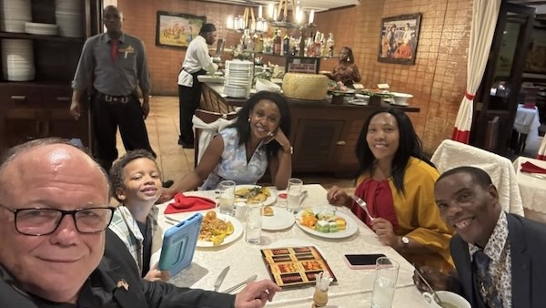 A group of people sitting at a table