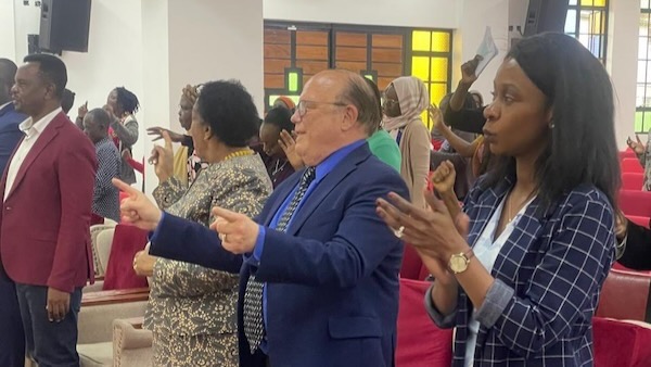 A group of people clapping
