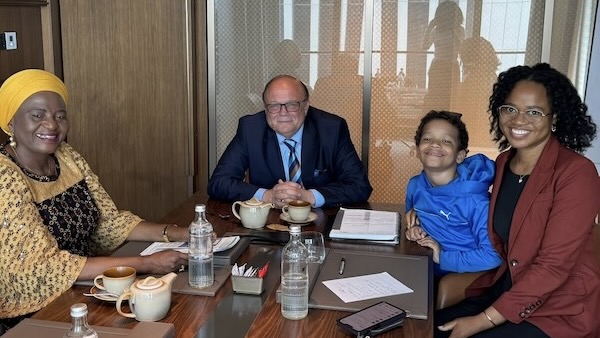 A group of people sitting at a table