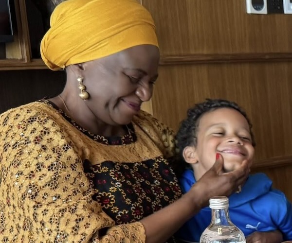A person and child smiling