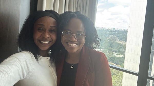 Two women smiling at the camera