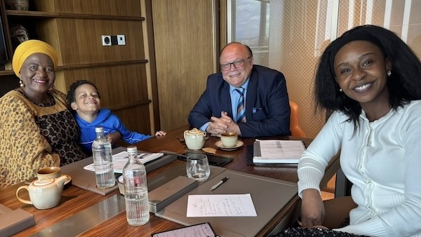 A group of people sitting at a table